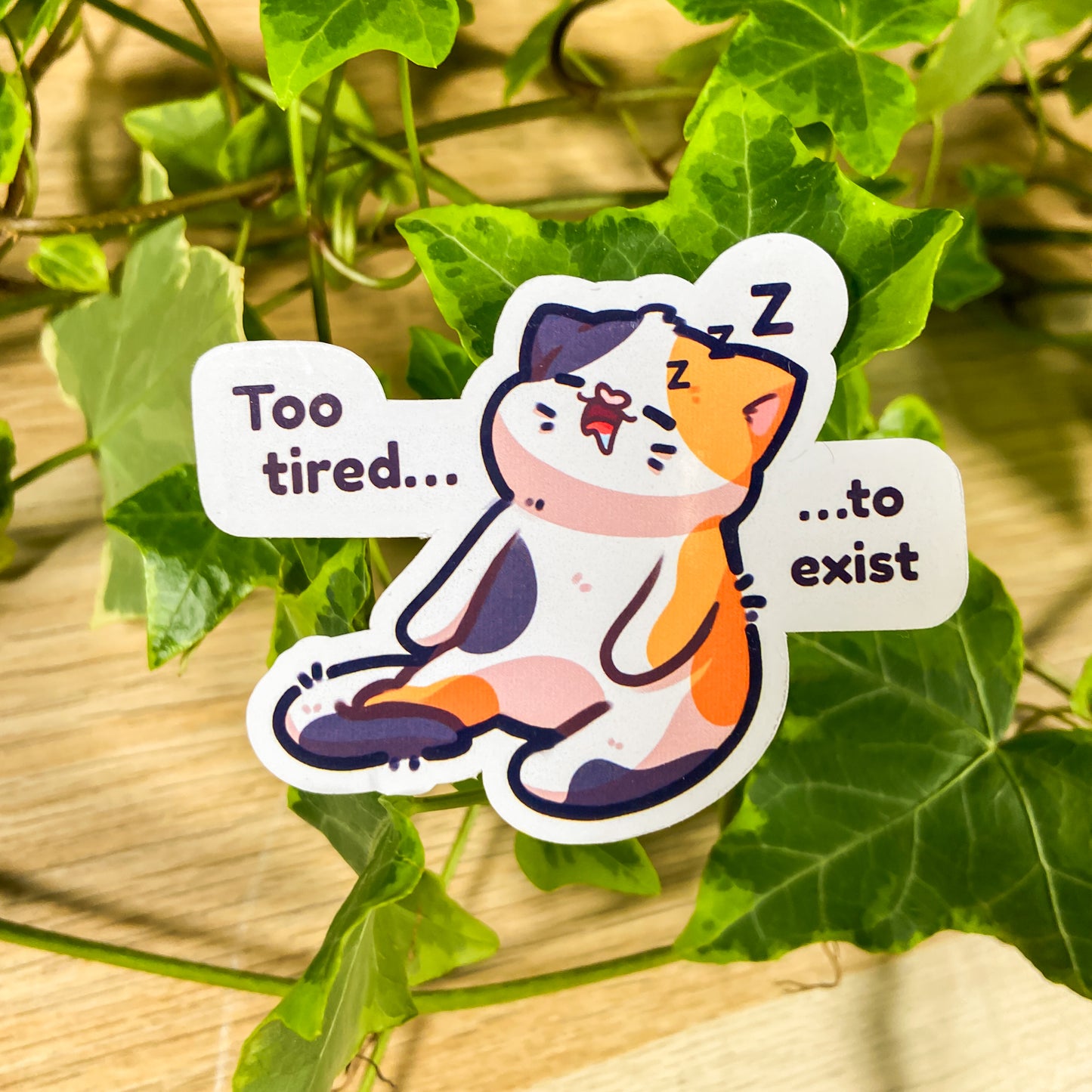 Tired cat sticker